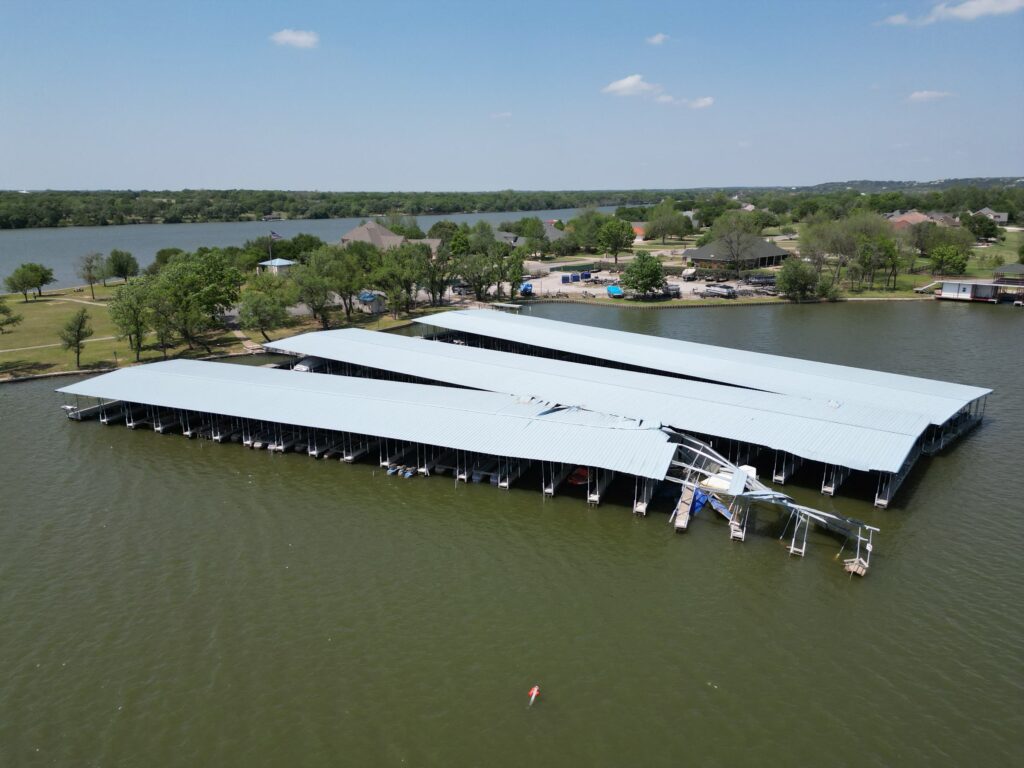 Storm-damaged docks at Mallard Pointe Marina after straight-line winds on Lake Granbury, Granbury, Texas