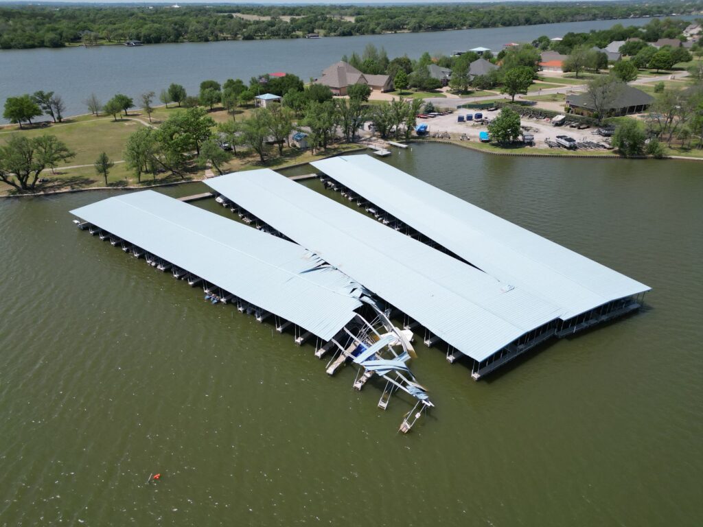 Storm-damaged docks at Mallard Pointe Marina after straight-line winds on Lake Granbury, Granbury, Texas