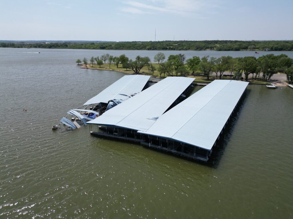 Storm-damaged docks at Mallard Pointe Marina after straight-line winds on Lake Granbury, Granbury, Texas
