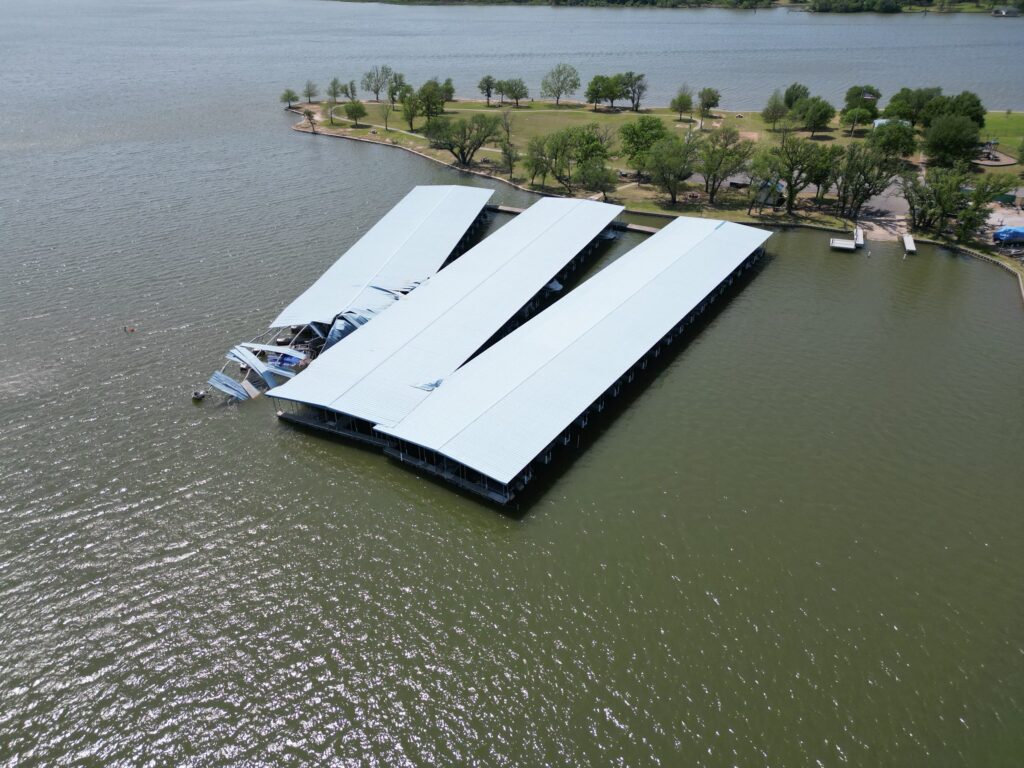 Storm-damaged docks at Mallard Pointe Marina after straight-line winds on Lake Granbury, Granbury, Texas