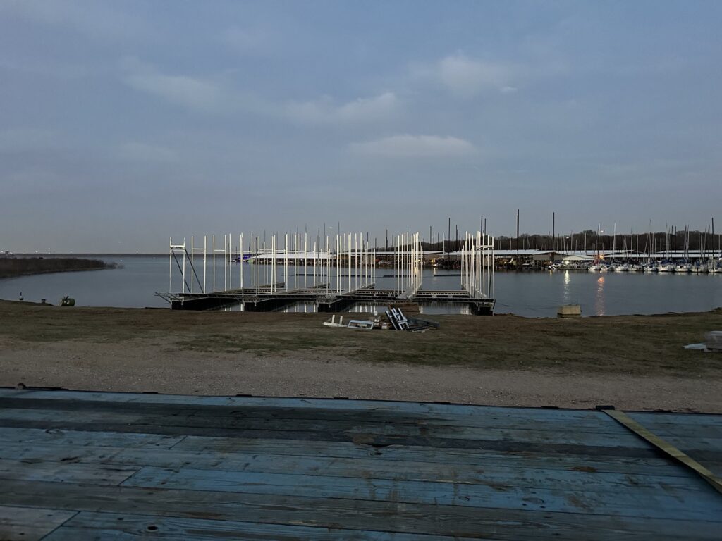 Pile-guided floating dock construction at Scott's Landing Marina on Lake Grapevine, Texas
