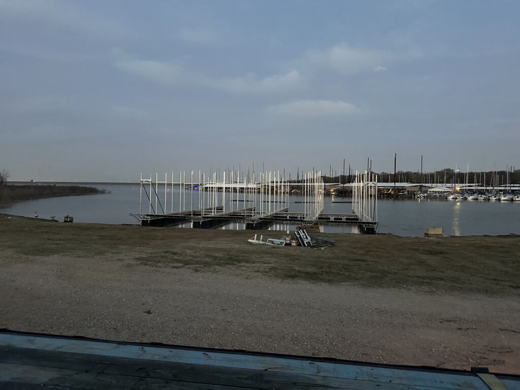 Pile-guided floating dock construction at Scott's Landing Marina on Lake Grapevine, Texas