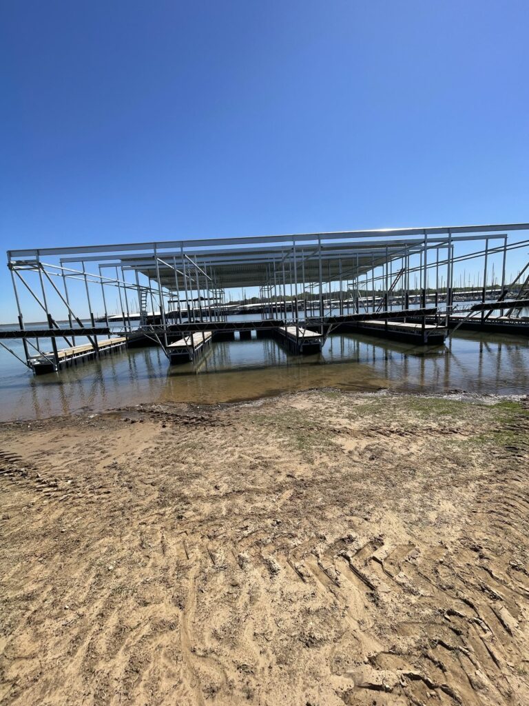 Pile-guided floating dock construction at Scott's Landing Marina on Lake Grapevine, Texas